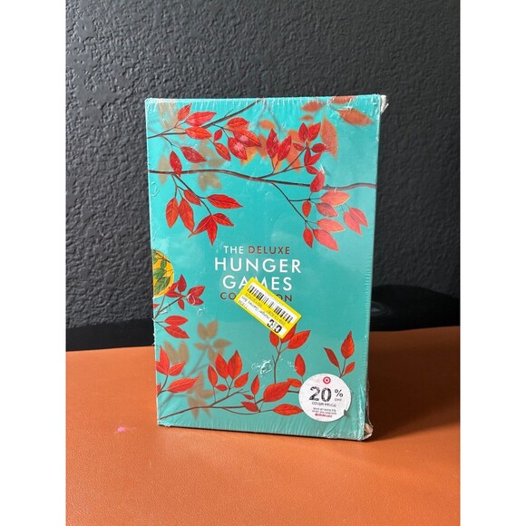 The Deluxe Hunger Games Collection by Suzanne Collins Paper Back  4 Books - Picture 1 of 5
